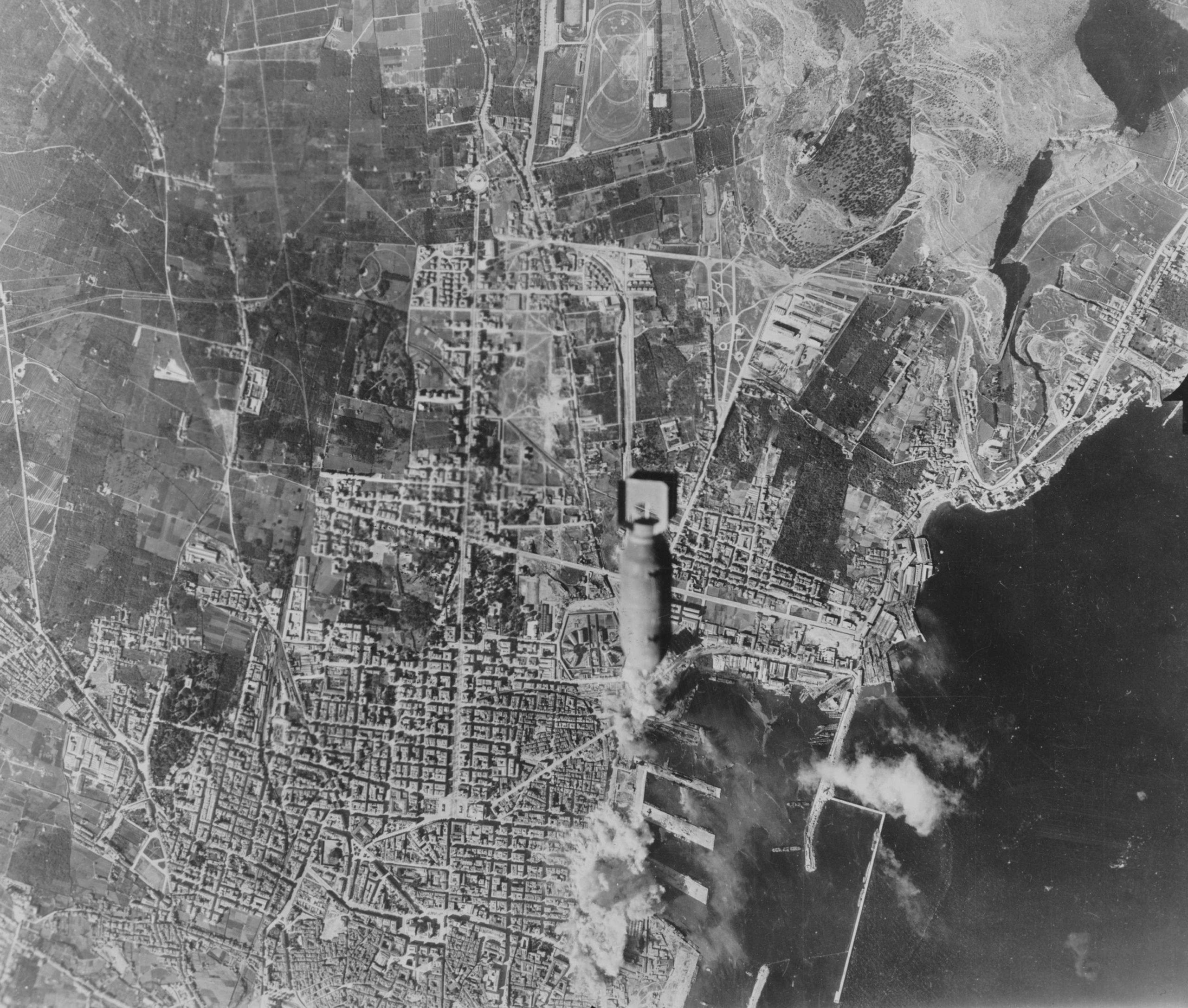Aerial view of the bombing of the harbor of the Italian city of Palermo