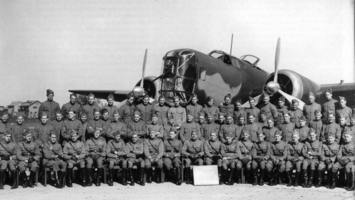 Dutch aviators pose in front of a Fokker T.V bomber