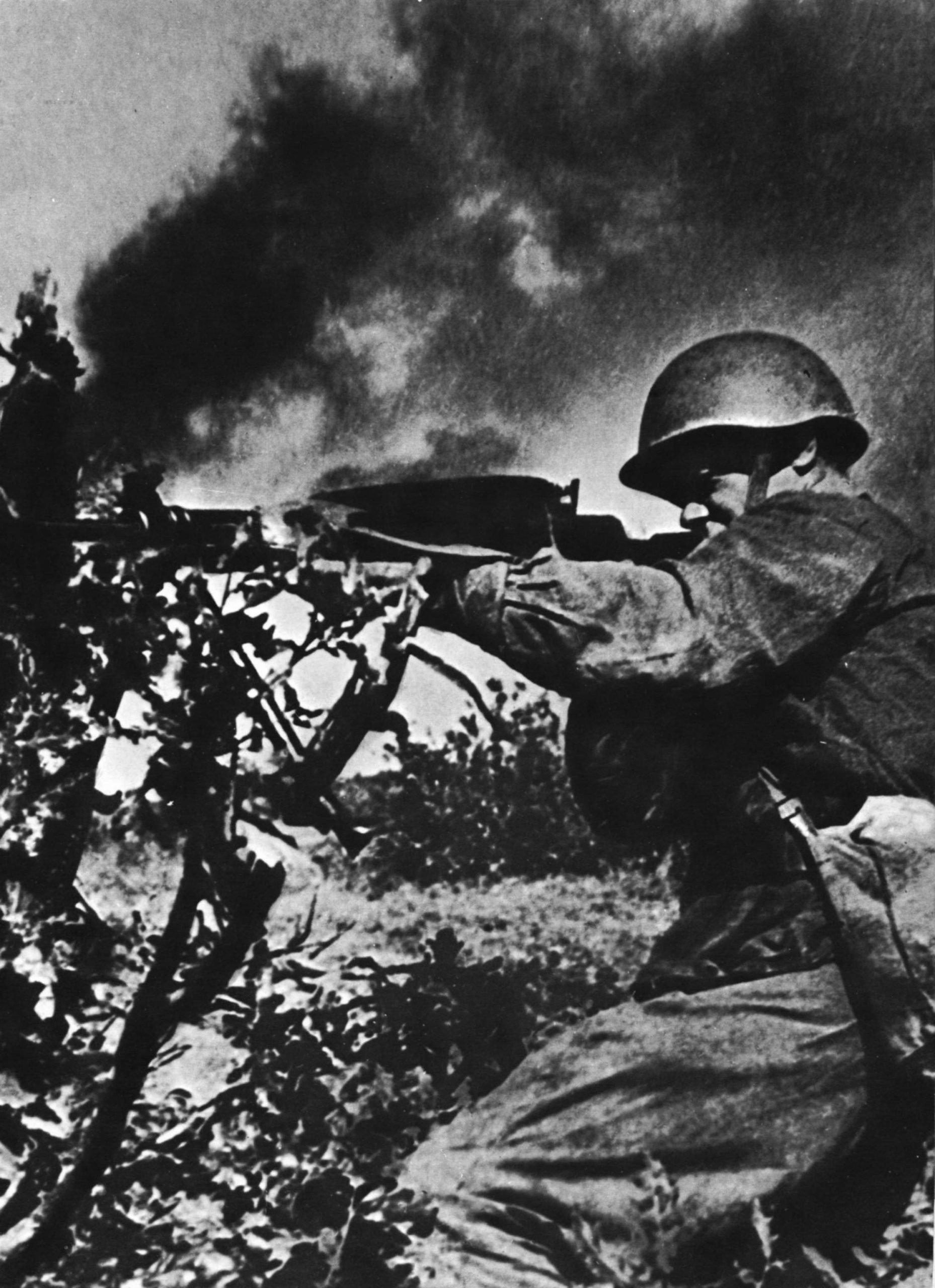 Soviet machine gunner firing